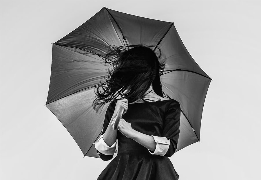 woman holding umbrella